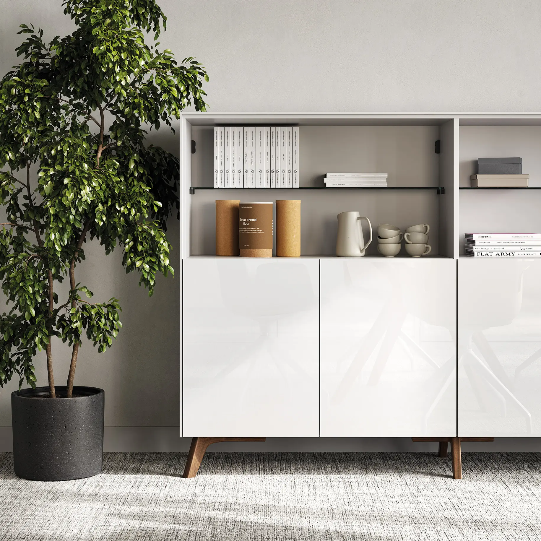 DEKKO Interiors | Αισθητική & Εργονομία στα Έπιπλα Γραφείου Η κατασκευή του γραφείου αποπνέει μια ευάερη και δυναμική αίσθηση, χάρη στην ξύλινη δομή του, η οποία είναι εμπνευσμένη από το στυλ "Mollinian". Αυτή η μοναδική κατασκευή στηρίζει είτε μια γυάλινη είτε μια ξύλινη επιφάνεια σε μια εντυπωσιακή ισορροπία αντίθετων δυνάμεων, δημιουργώντας ένα εντυπωσιακό οπτικό αποτέλεσμα. Το πολύτιμο ξύλο καρυδιάς παίζει κεντρικό ρόλο στον σχεδιασμό του γραφείου. Η επιφάνεια εργασίας, κατασκευασμένη από φυσικό καρυδιά ξύλο, είναι το αποκορύφωμα της υλικότητας και της χειροτεχνίας, με ένα συμπαγές προφίλ και στρογγυλεμένες άκρες που αναδεικνύουν τη φυσική ομορφιά του υλικού. Η γοητεία του κρυστάλλου συναντά την ισχυρή και στιβαρή αίσθηση του μαόνι kotibé στη δομή του γραφείου. Προτείνεται σε δύο εκδόσεις: λευκή και ανθρακί λάκα, προσφέροντας έτσι ευελιξία στον σχεδιασμό του εσωτερικού χώρου. Οι κρυστάλλινες επιφάνειες είναι διαθέσιμες σε τρεις εκδόσεις: εξαιρετικά διαφανές γυαλί, λευκό λακαρισμένο γυαλί, και καπνιστό γυαλί, όλα πάχους 15 mm, προσδίδοντας μία επιπλέον διάσταση πολυτέλειας.